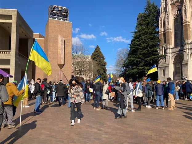 People on UW Red Square waving Ukrainian flags.