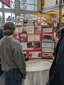 A student project at Ballard High School's MisinfoNight debunking online reports that Queen Elizabeth II of the United Kingdom died in February.