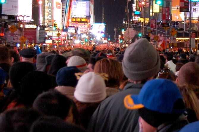 A crowd of people in Times Square, New York City.